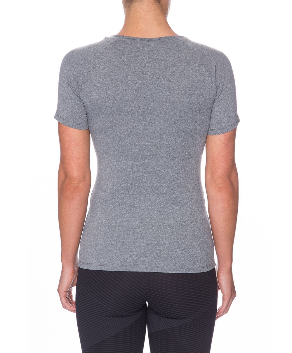 Front view product image with model for Brasilfit activewear Q T-shirt in gray.  The Q T-shirt is part of our basics activewear collection that is focused on performance, high compression activewear.