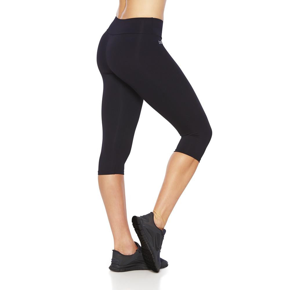 Side view product image for Brasilfit Emana under knee activewear leggings. Brasilfit Emana fabric helps reduce celluite. Emana leggings are part of our essentials and basics activewear collection that is focused on high compression, performance activewear.