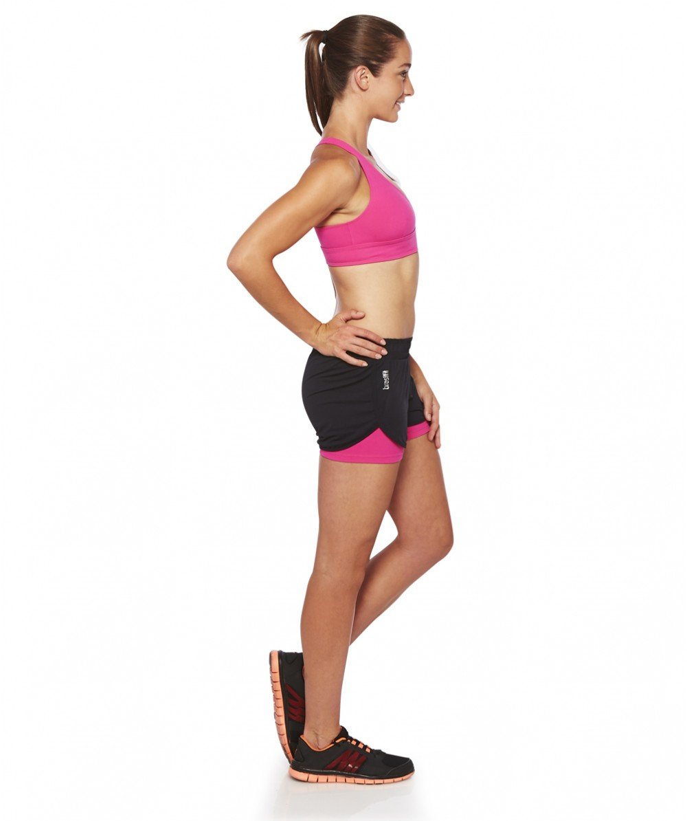 Front view product image with model for Brasilfit Ilheus activewear crop top in pink.  The Ilheus Crop top is part of our basics activewear collection that is focused on performance, high compression activewear.